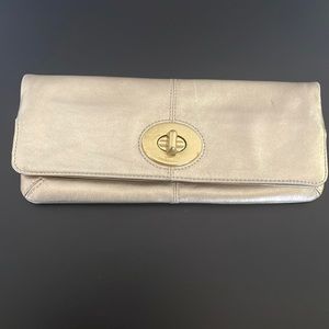 Coach gold leather toggle clutch